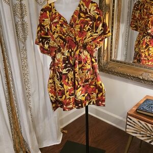 It has pockets! Floral Midi Dress in Red and Yellow